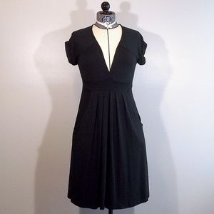 Lush black cap sleeve empire waist pleated dress